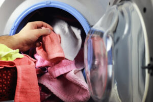 an overloaded dryer with lint buildup lurking in the background. 